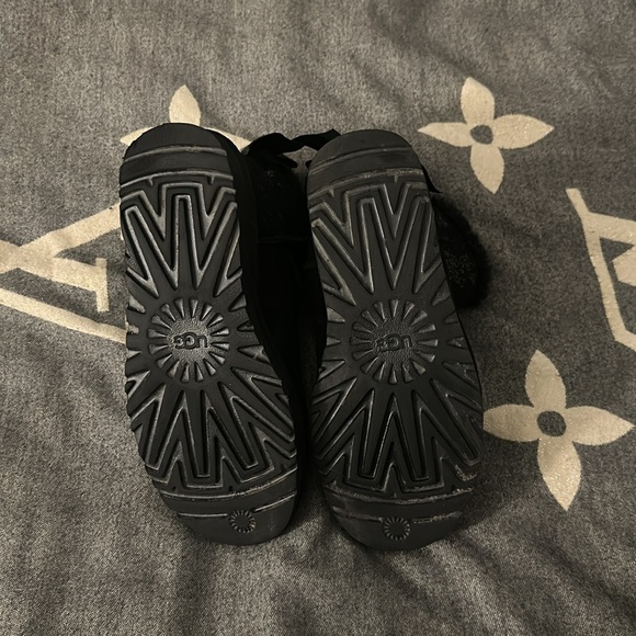 UGGs for sale. Women’s size 7. They are black with gold and a bow on the back. - Picture 6 of 6